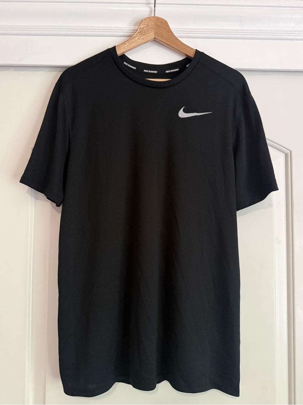Nike Black Short Sleeve Performance Tee with Silver Swoosh